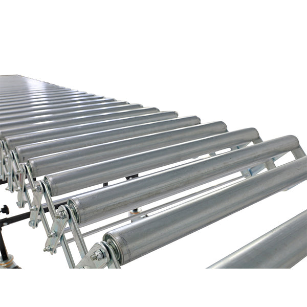 Close-up view of metal rollers on an expandable conveyor system.