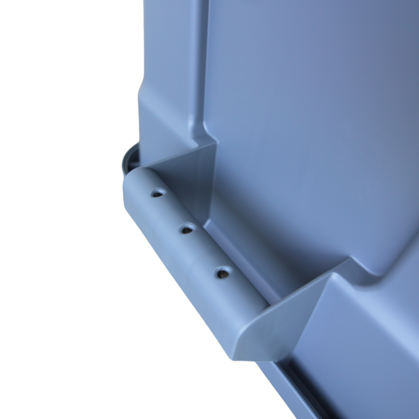 Close of of an upside down grey storage container showcasing the underneath of the handle grip.