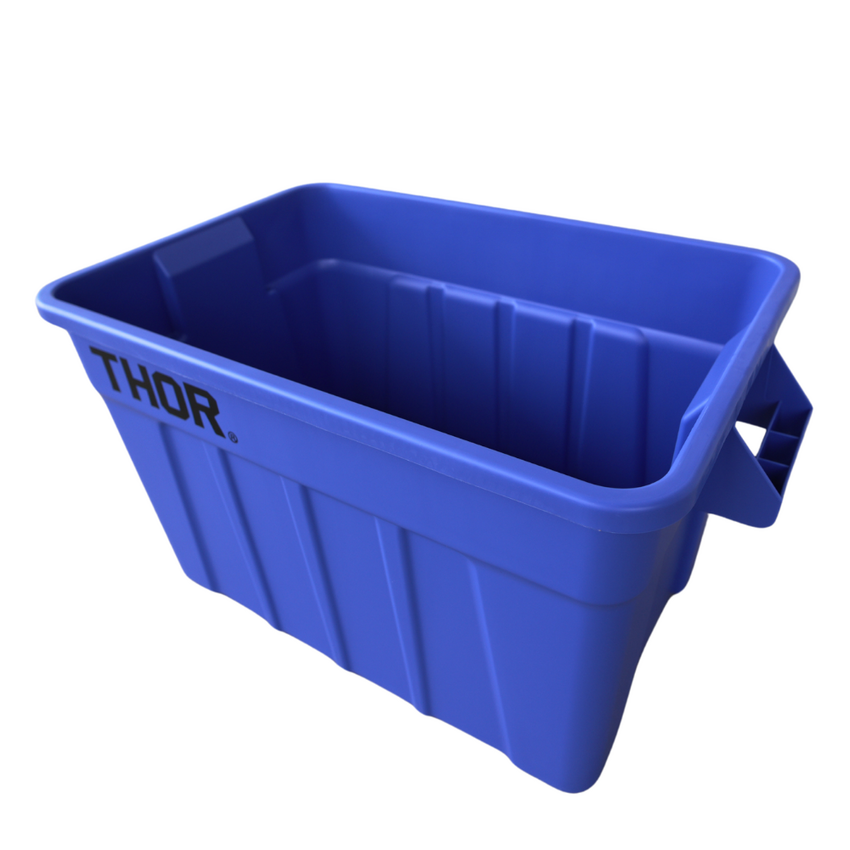 Side view of a large blue storage container with the lid off, side handles for easy grip and "Thor" logo displayed.