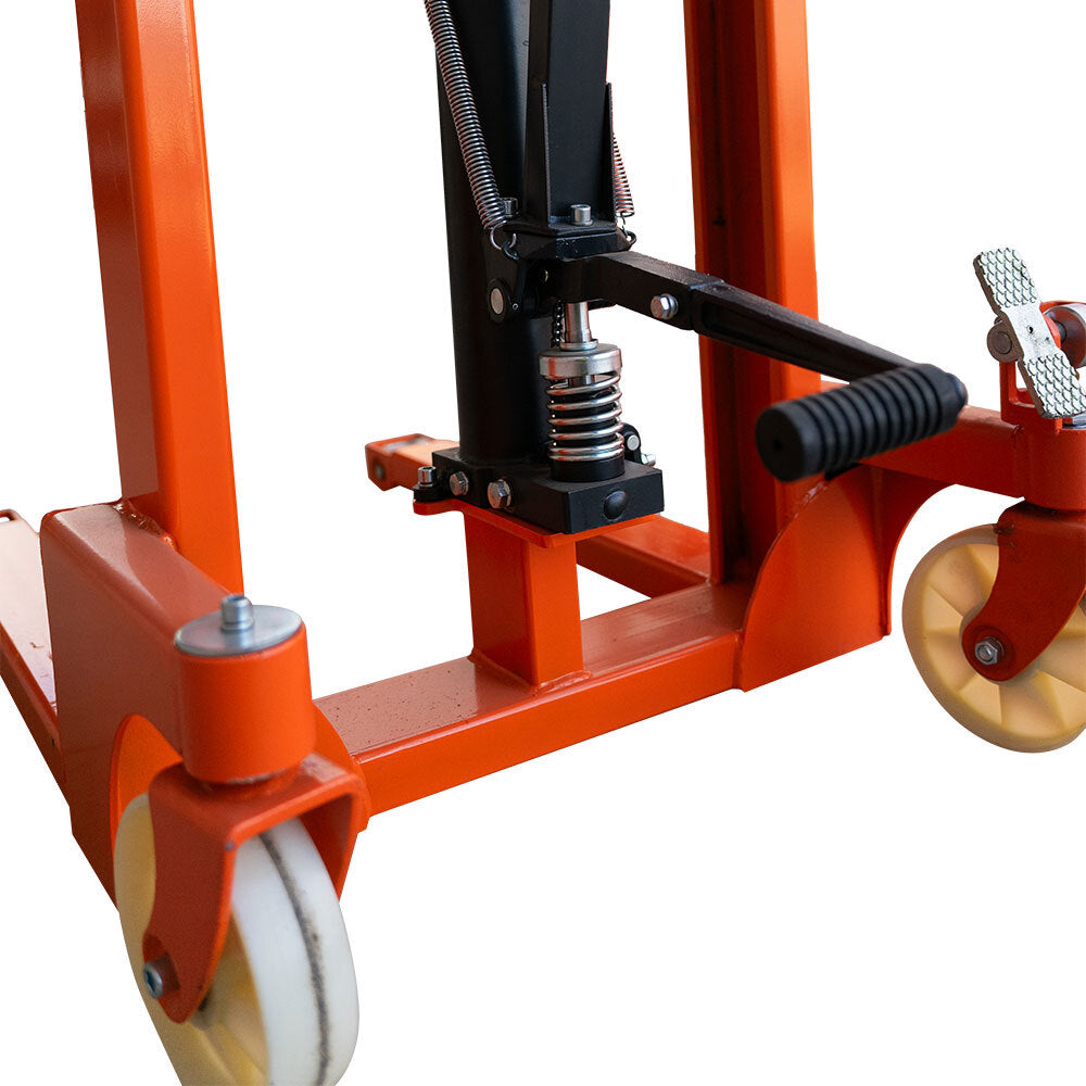 Close-up of an orange hydraulic lift's base with wheels, springs, and a lever, showcasing its robust construction and functionality.