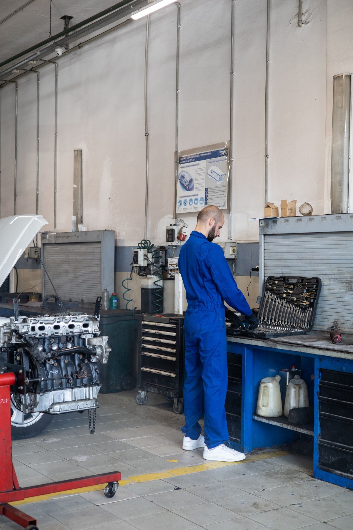 Mechanic working at bench height in a workshop