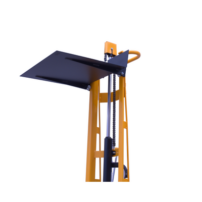 Close-up of a yellow lifting mechanism featuring a black platform and hydraulic components, designed for material handling tasks.
