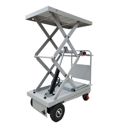 Scissor lift table with a raised platform, hydraulic mechanism, and wheels for mobility, ideal for lifting heavy loads in various settings.
