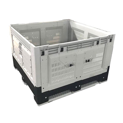 A large, stackable plastic storage crate with vented sides, featuring a black base and white frame, ideal for transporting goods.