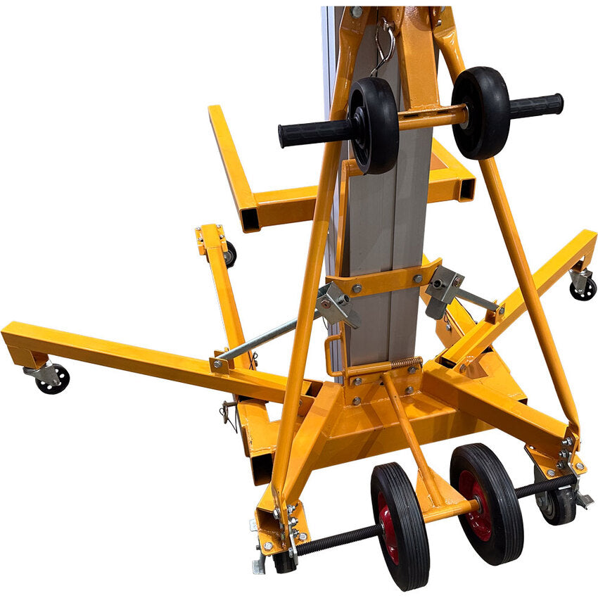 Close-up of a yellow crane lift base featuring wheels and support arms, designed for lifting and maneuvering heavy loads.