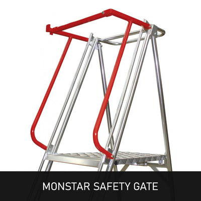 A close-up of the Monstar Safety Gate, featuring a red top bar and silver frame, designed for enhanced safety on ladders.