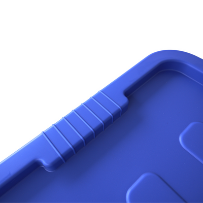 Close up of a blue storage container ribbed lid design where the handle grip is located.