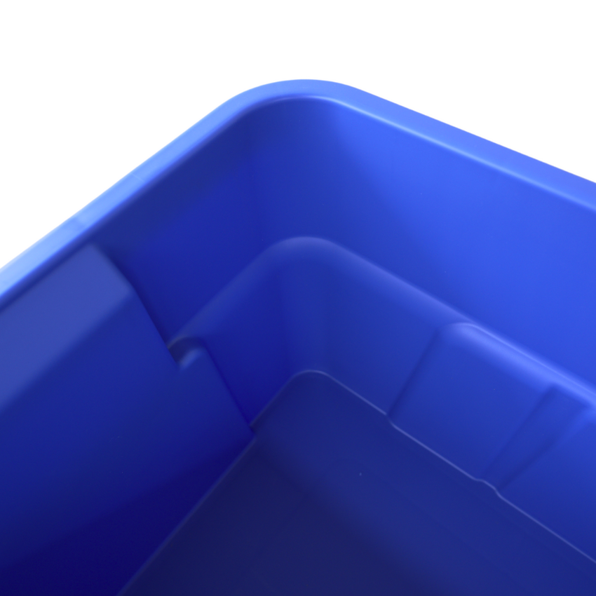 Close up of the inside corner of a blue storage container showing the smooth rounded edge.