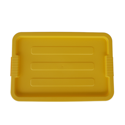 Above view of a yellow storage container looking at the ribbed lid design.