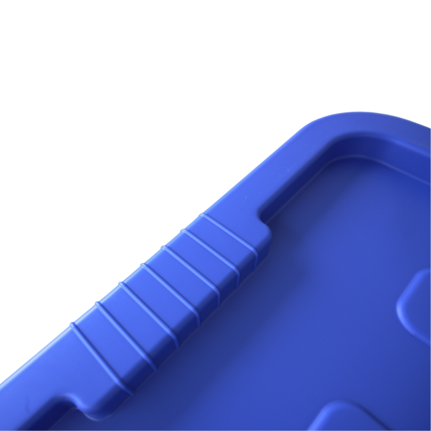 Close up of a blue storage container ribbed lid design where the handle grip is located.