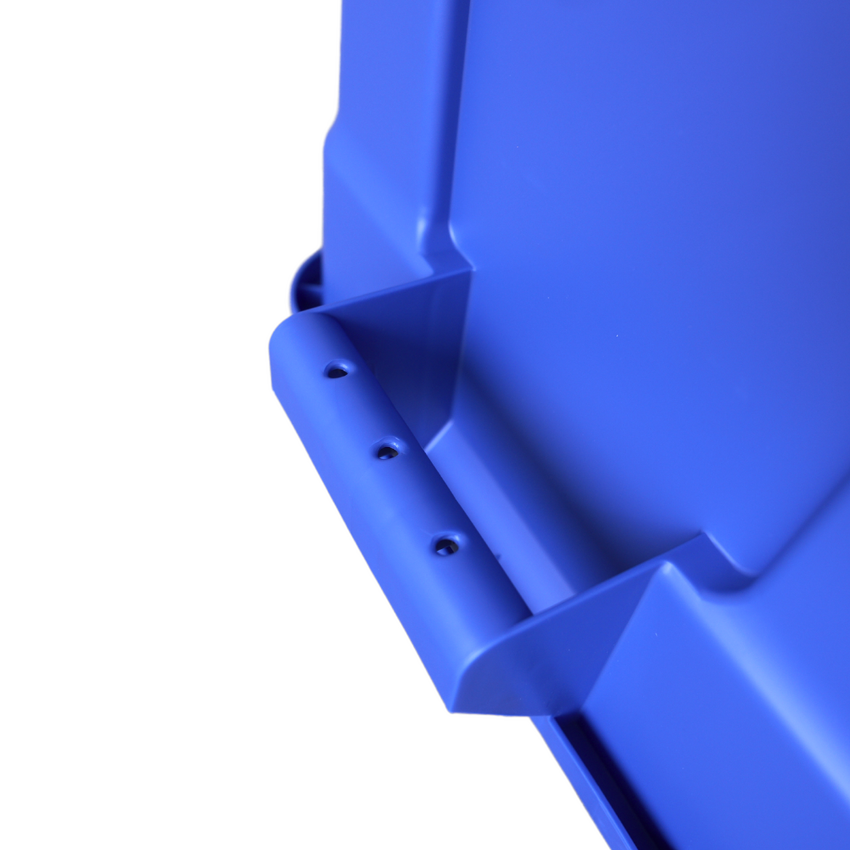 Close of of an upside down blue storage container showcasing the underneath of the handle grip.