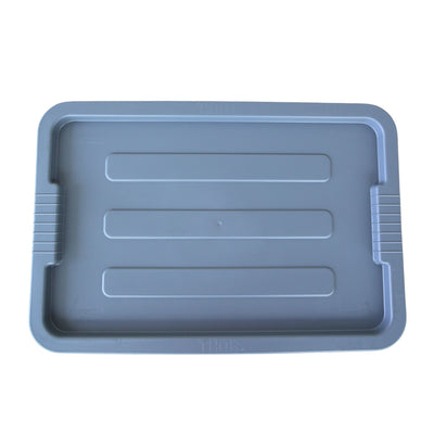 Top view of a grey plastic lid container with textured lines, featuring grip handles on the sides, ideal for food or utility use.