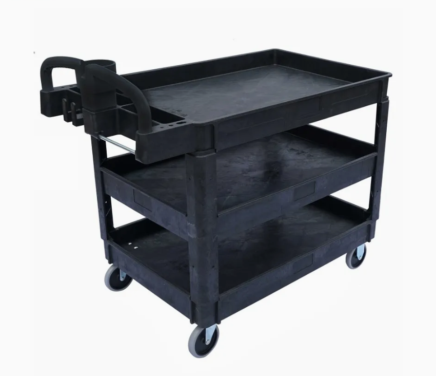 Black three-shelf utility cart with molded plastic trays and handles, mounted on swivel casters for easy mobility.