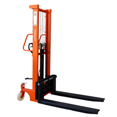 Orange manual stacker with a vertical mast and two long black forks, designed for lifting and moving pallets easily.